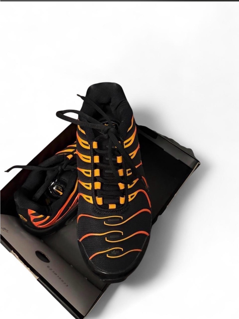 Nike Black Sneakers with Orange Accents
